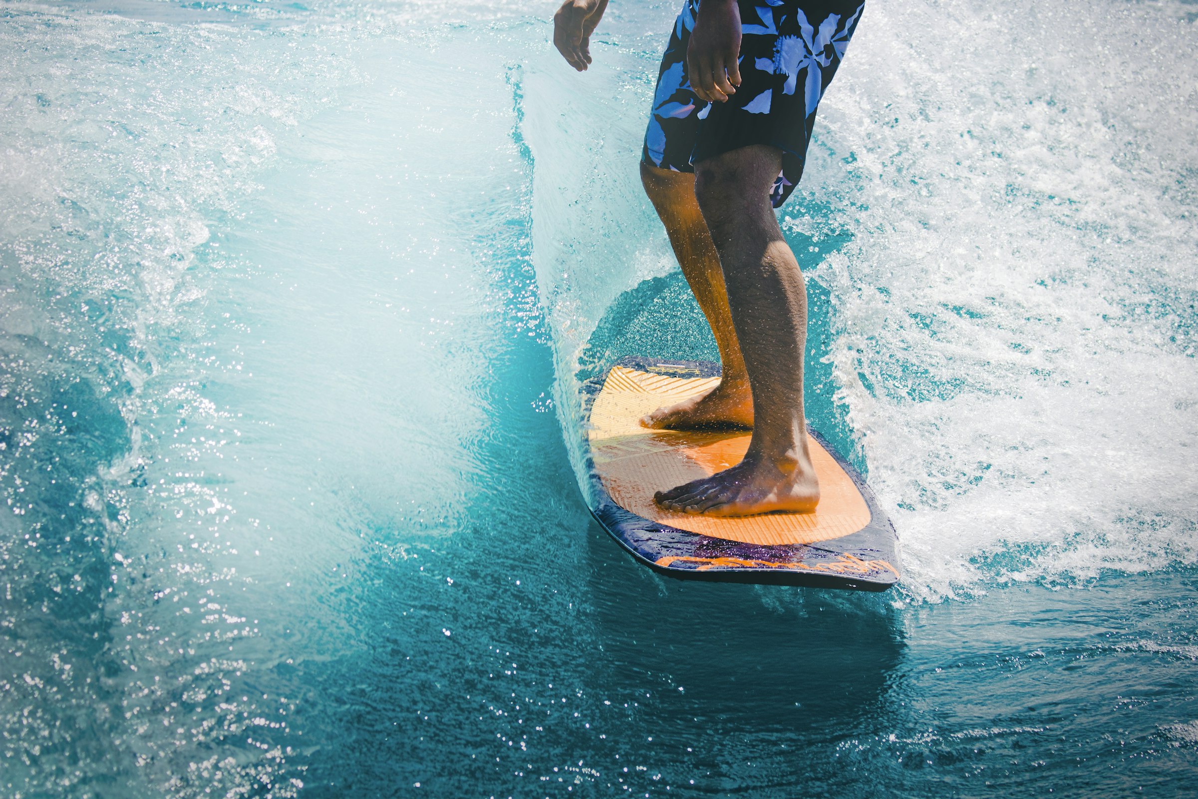 Sea-Doo personal watercraft cutting through open water at dusk